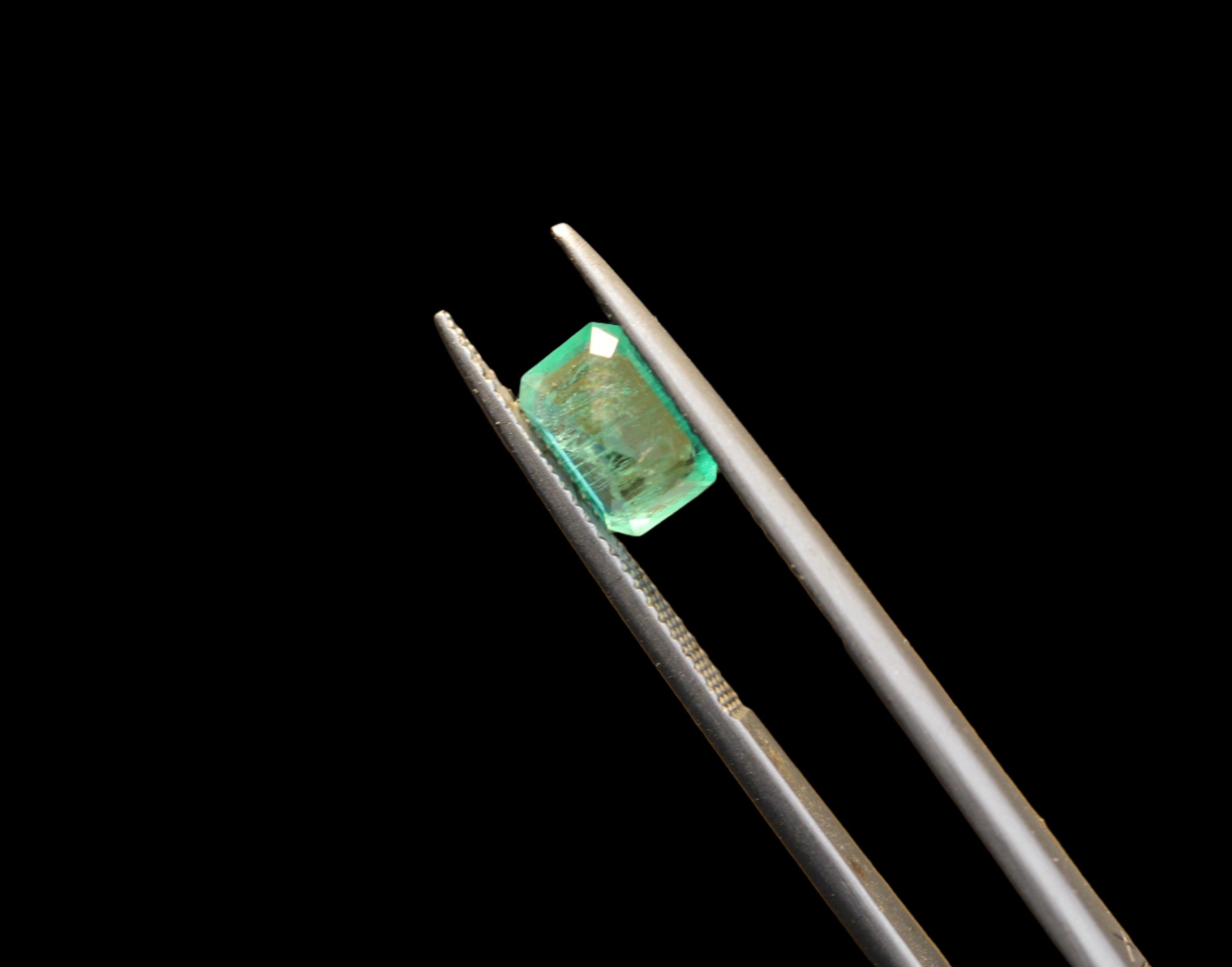 faceted emerald stone